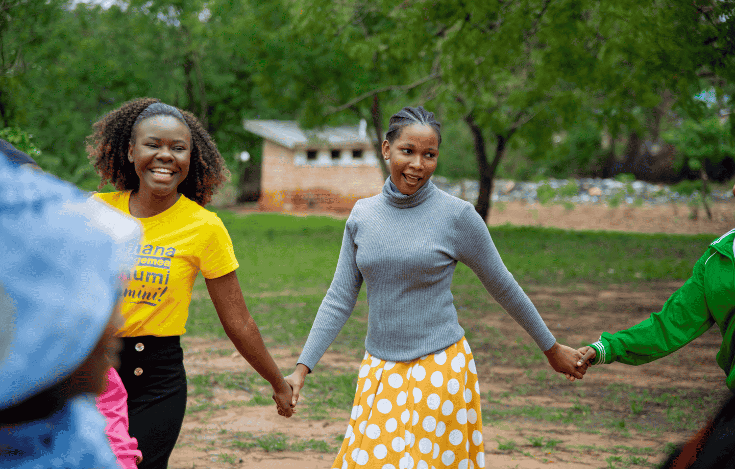 Group of empowered young women standing together