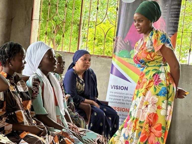 Zakia msangi speaking to people at Msimbu